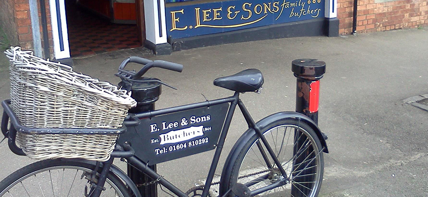 E Lee and Sons traditional bicycle outside the shop in Earls Barton