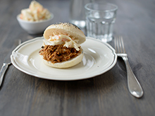 hog roast in a roll on a plate